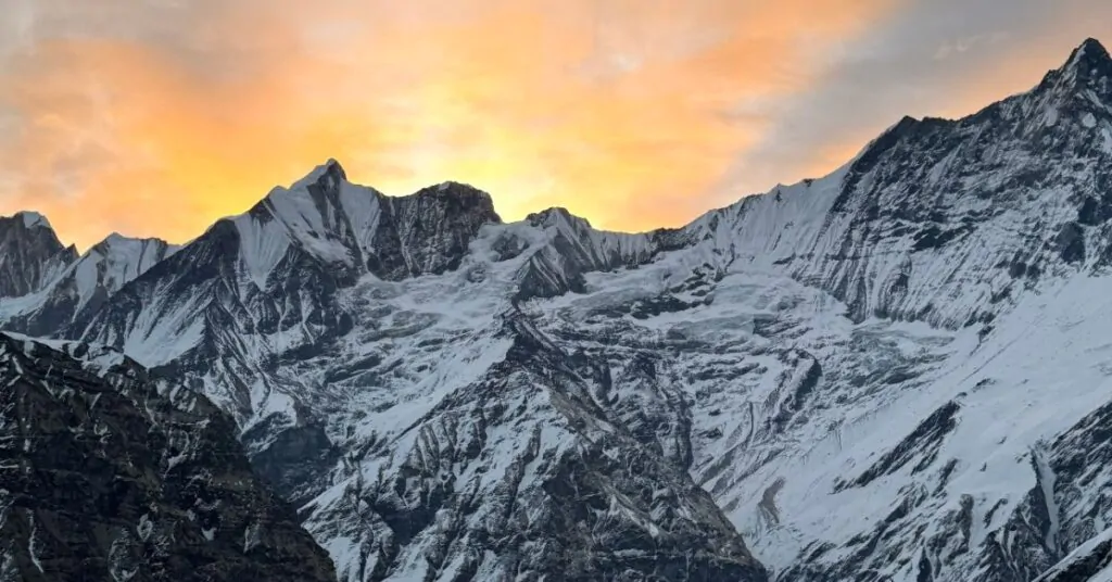 Sun rays coming from behind the mountain